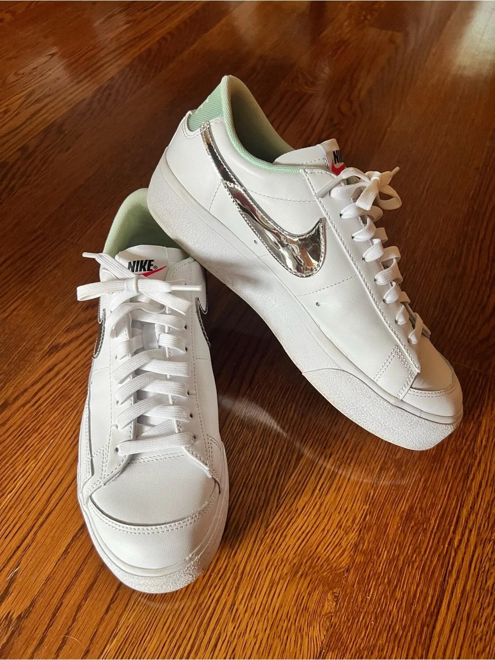 Nike Women’s Blazer Low Platform White Sneakers with Metallic Silver Swoosh